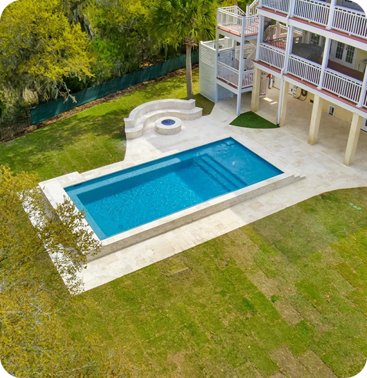 Backyard Pool in Charleston SC with white patio